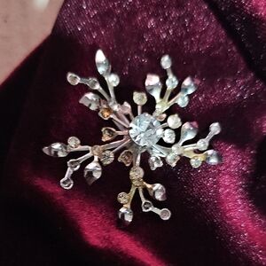 Elegant Silver and Gold Snowflake Brooch